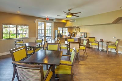 Bright dining area with modern chairs and tables