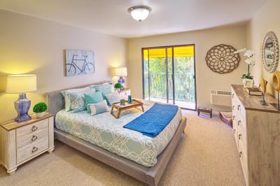 Cozy bedroom with natural light and decor
