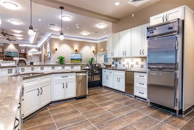 Brightly lit kitchen area in a senior living facility