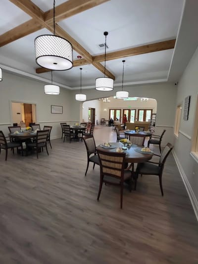 Interior view of a dining room with tables and decor