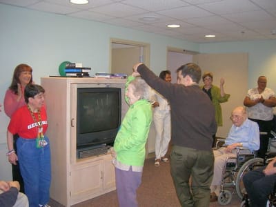 Residents and staff engaging in a fun activity