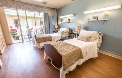 Cozy shared room with two beds and outdoor view