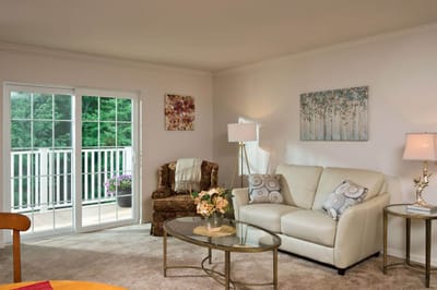 Cozy living room area with access to a balcony
