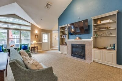 Cozy common area with a fireplace and seating