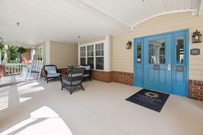 Covered entrance to Harbor Cove Memory Care facility