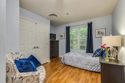 Cozy private resident room with blue accents