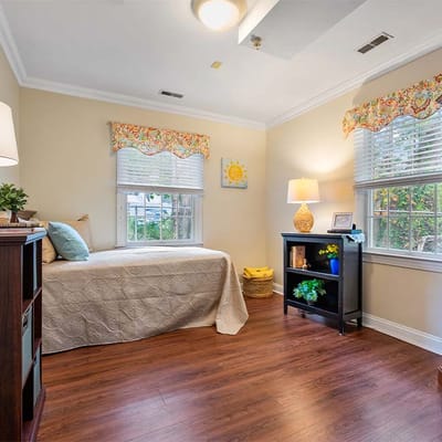 Cozy private room with natural light and decor