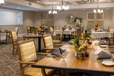 Cozy dining area with tables set for a meal