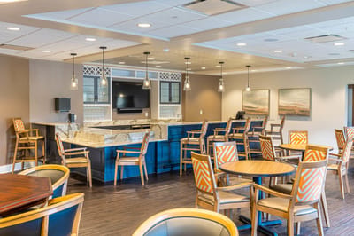 Bright dining area with tables and chairs