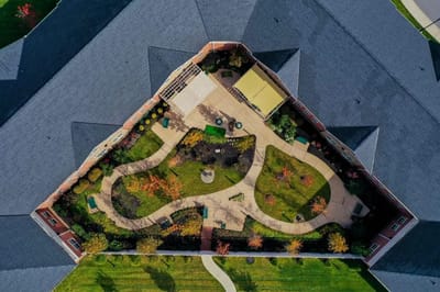 Aerial view of landscaped outdoor space with walking paths