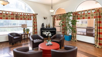 Common area with comfortable seating and large windows