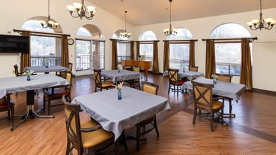 Bright dining room with tables and chairs