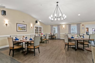 Dining room with tables set for a meal