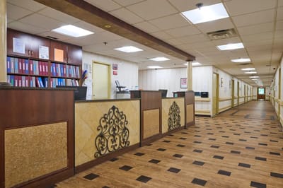 Bright hallway with reception area and office spaces