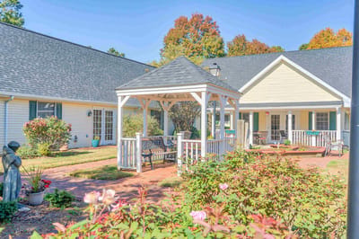 Outdoor gazebo in a landscaped garden area
