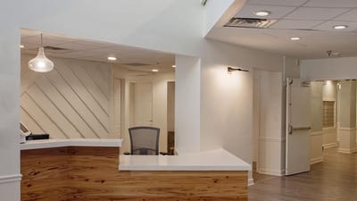 Reception area with modern design and warm lighting
