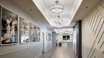 Bright interior hallway with framed artwork