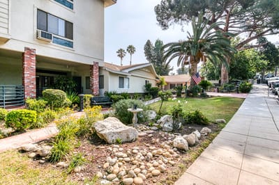 Exterior view of the facility's garden and entrance