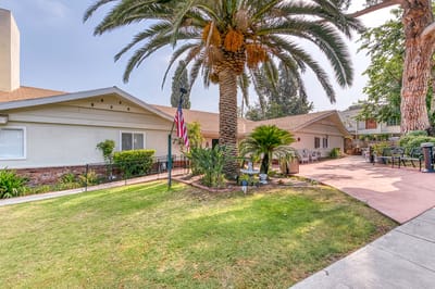 A well-maintained garden area of a senior living facility