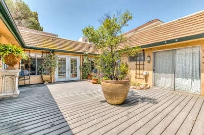 Garden area with potted plants and seating space