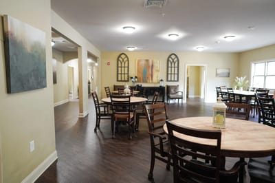 Interior view of a dining area with tables and chairs