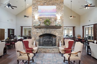 Interior view of a cozy common area with a fireplace