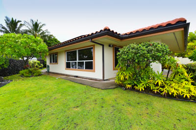 Exterior view of a building surrounded by greenery