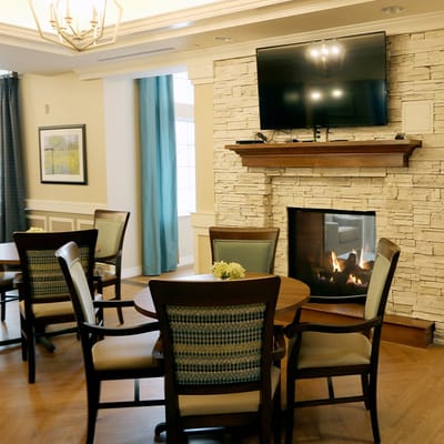 Cozy common area with a fireplace and seating