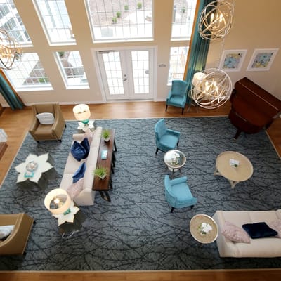 Interior common area with seating and decorative lamps
