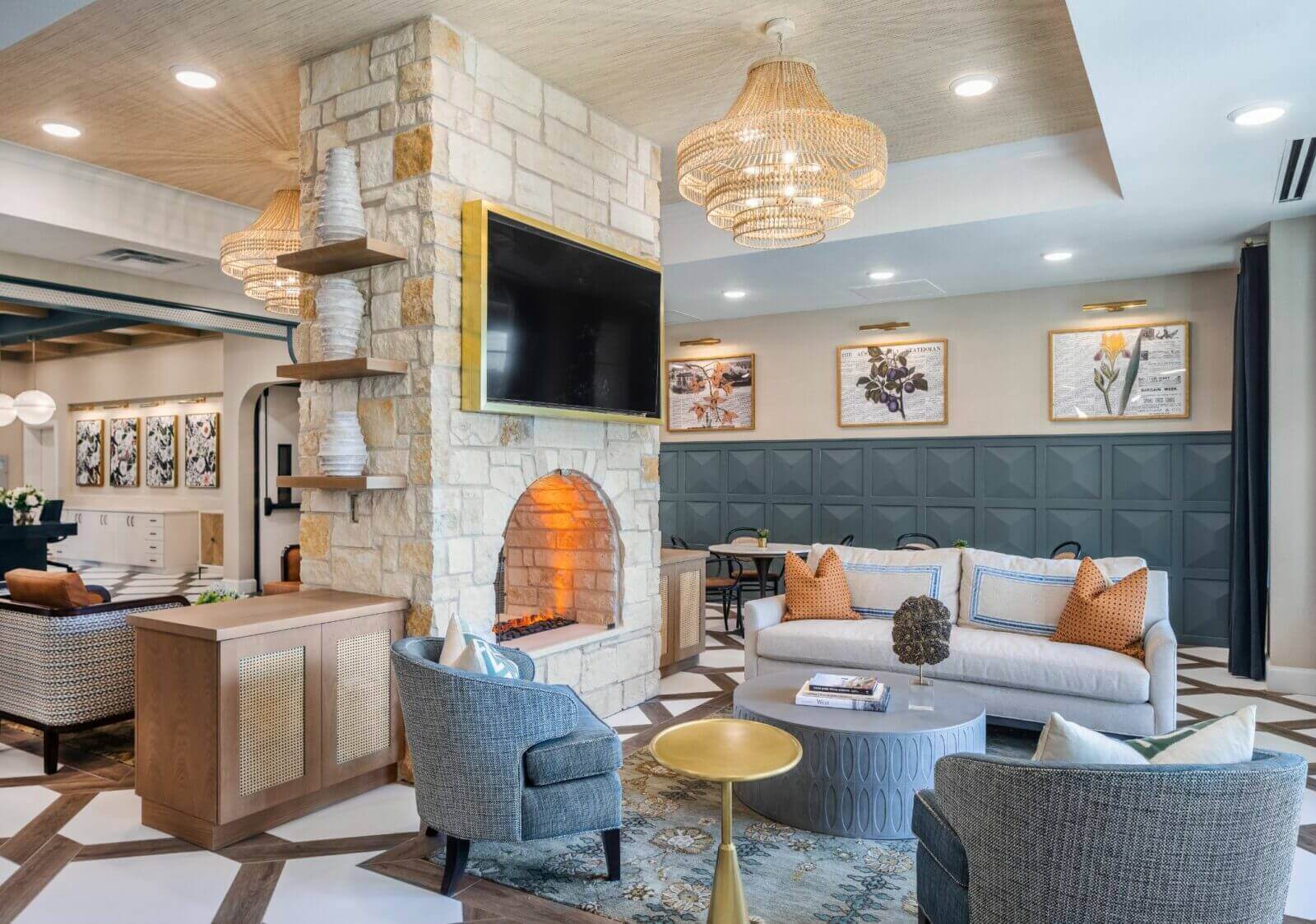 Interior lounge area with a cozy fireplace and seating
