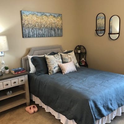 Cozy interior of a resident's private room with decor