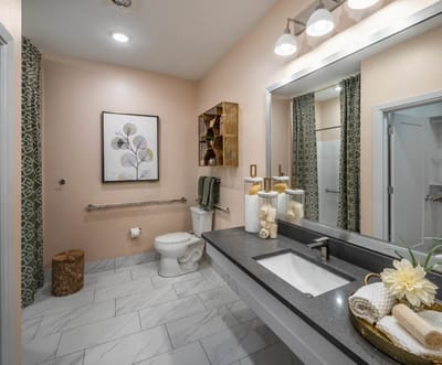 Brightly lit bathroom with modern decor