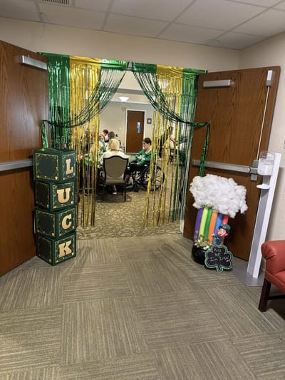 Residents participating in a festive activity space