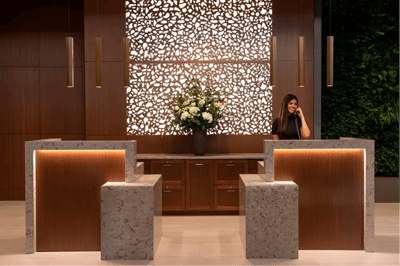 Staff member at a modern reception area