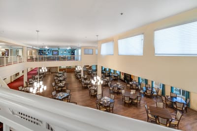 View of a spacious dining room with tables