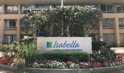 Facility logo on a landscaped sign