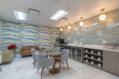 Bright and inviting common area with seating and decor