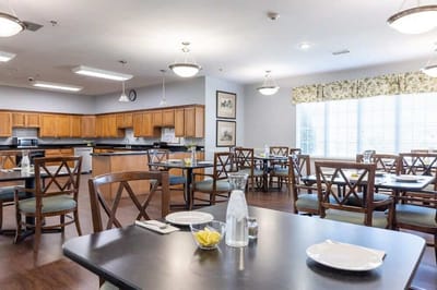 Dining area with tables set for a meal