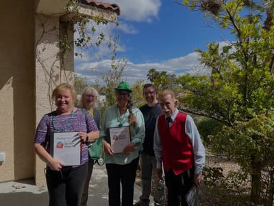 Group of residents enjoying the outdoors with awards