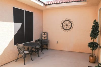 Outdoor courtyard with seating and decor