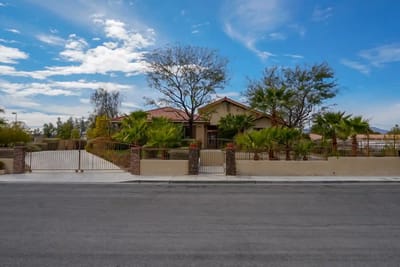 Exterior view of Nevada Memory Care facility with gardens