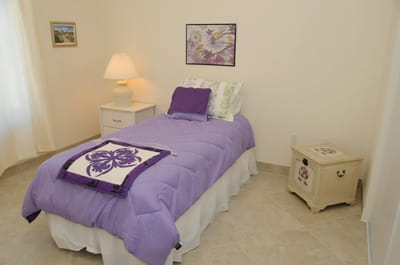 Cozy resident room with a bed and decor
