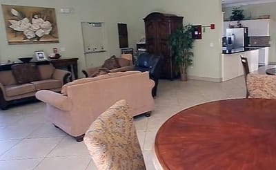 Common area with seating and a dining table