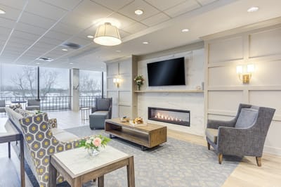 Comfortable common area with seating and fireplace