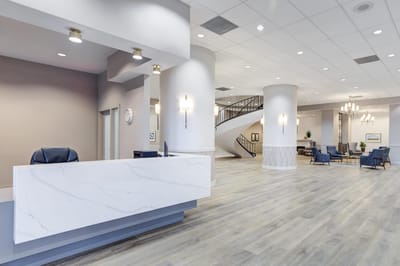Spacious reception area with seating.