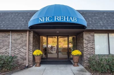 Exterior view of NHC Rehab facility entrance