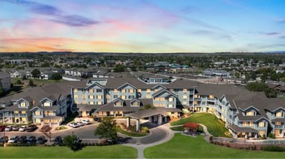 Aerial view of Whispering Chase facility with landscaped grounds