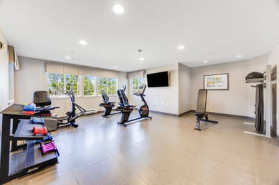 Interior view of a fitness area with exercise equipment