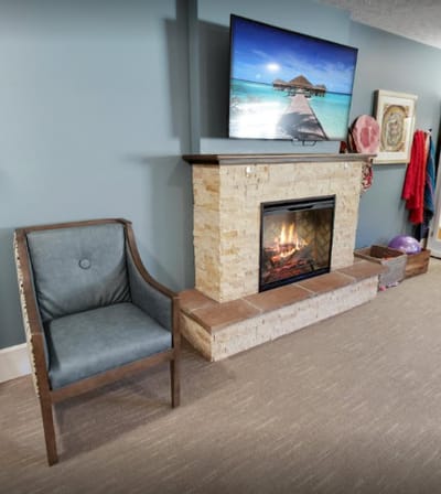 Cozy fireplace in a common area lounge