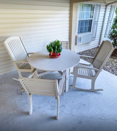 Outdoor seating area with chairs and a table